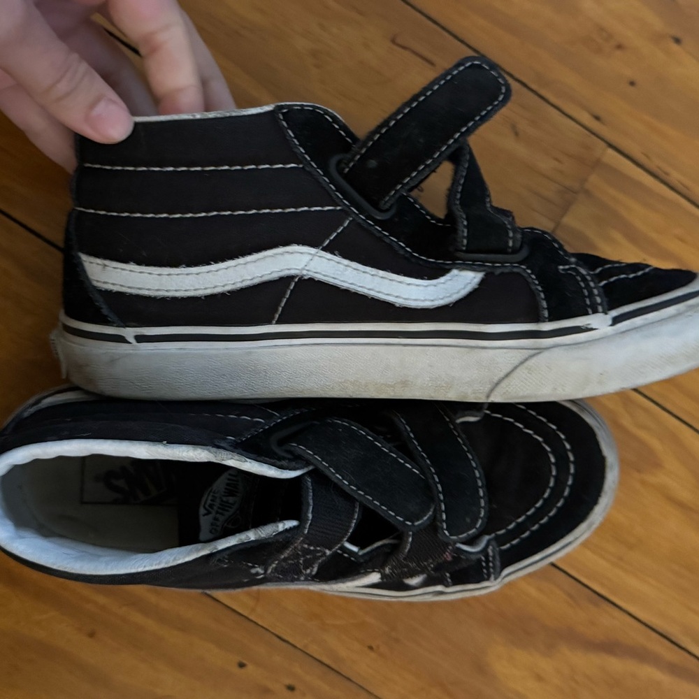 Vans Black and White Mid-Top Sneakers